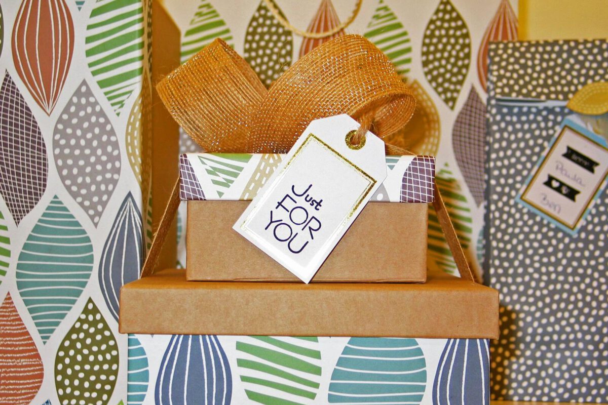 Beautifully wrapped gift boxes with a bow and 'Just For You' tag, perfect for celebrations.